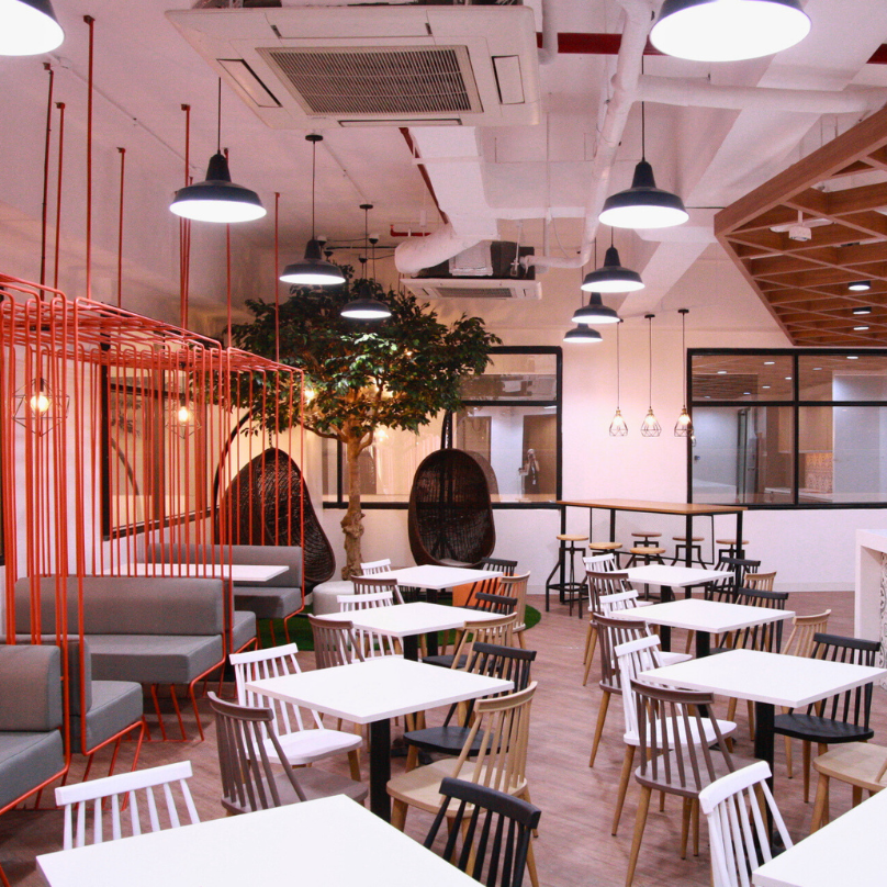 Figari office common area with seating and lounge space