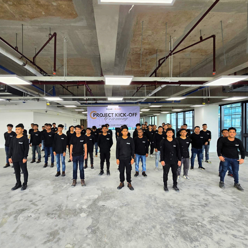 Figari Construction Team group photo at project site with construction workers