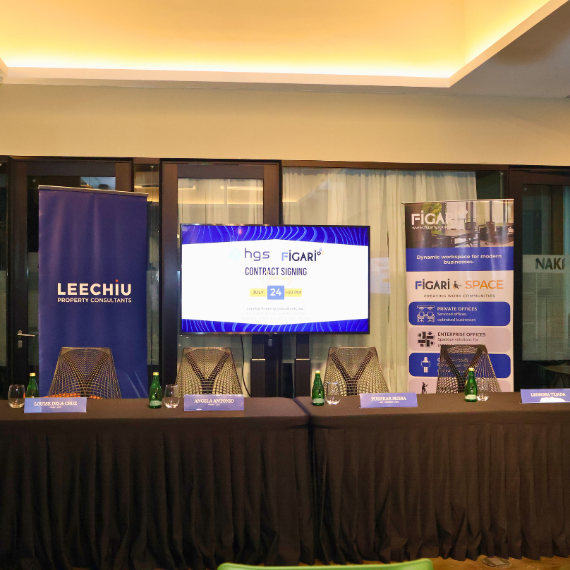 Event backdrop for Figari and HGS contract signing ceremony