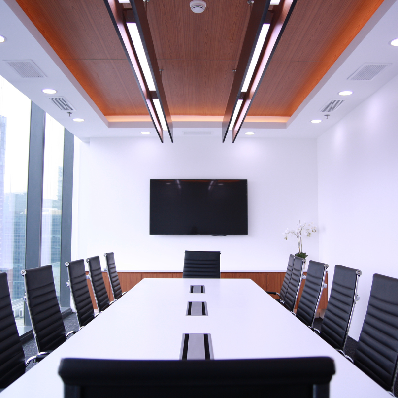 The Curve modern meeting room with conference table and chairs